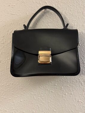 Elegant Black Patent Top-Handle Satchel with Gold Lock